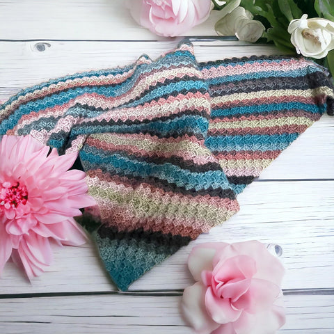 
Cozy winter scarf in layered crochet design

Artisan-crafted crochet scarf in boho style

Multi-color crochet scarf styled with winter coat

Handcrafted crochet wrap for women and men