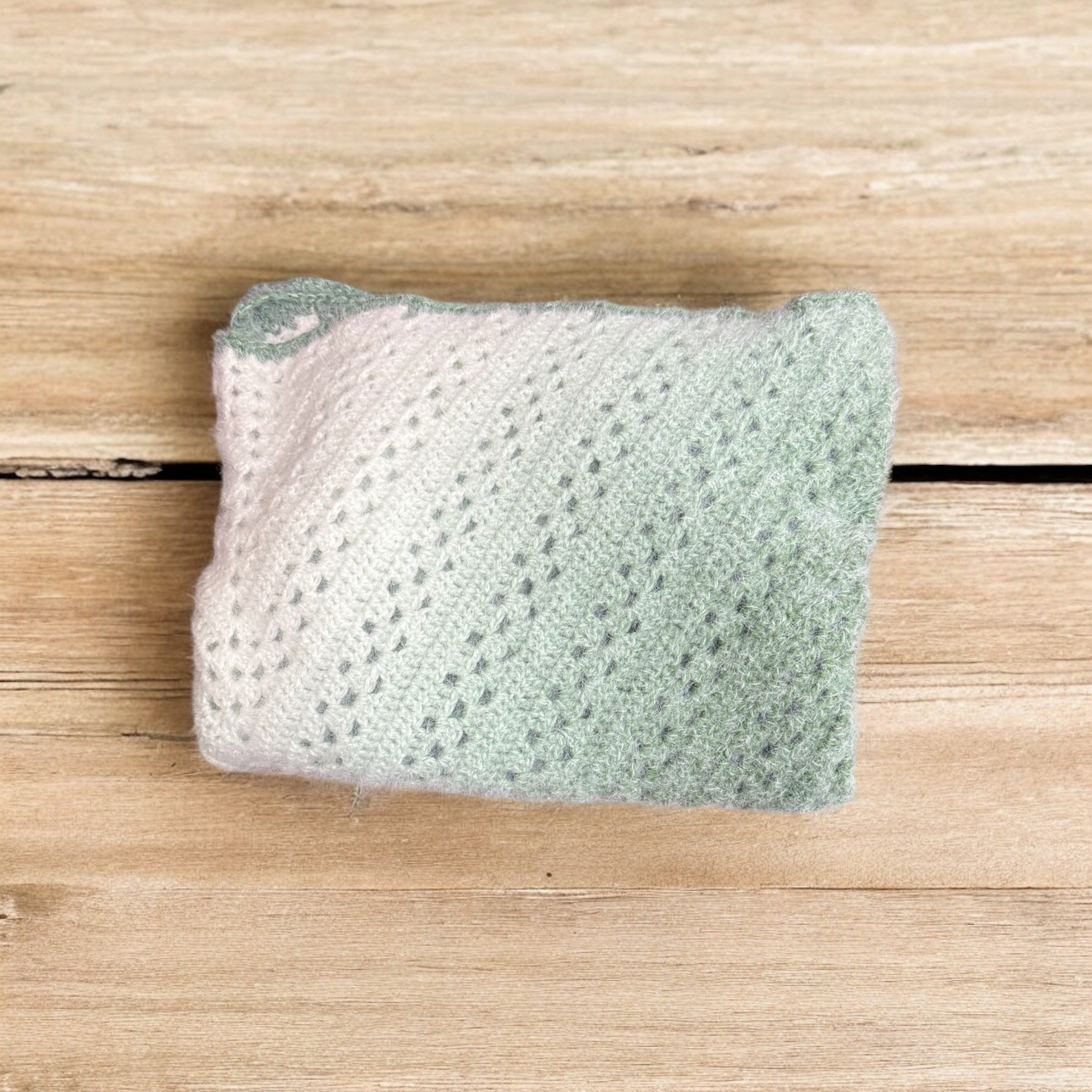 Handmade crocheted sage green ombre shawl wrap

Lightweight crochet wrap in ombre green tones