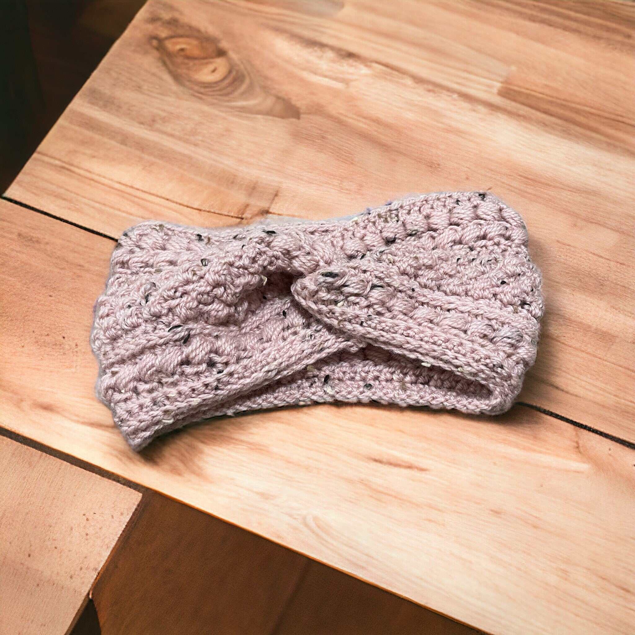 Handmade crochet headband ear warmer in winter bobble design

Cozy chunky knit headband ear warmer for women UK

Soft wool crochet ear warmer in neutral winter colour

Stylish crochet headband ear warmer with bobble detail

Handmade winter crochet accessory – cozy ear warmer