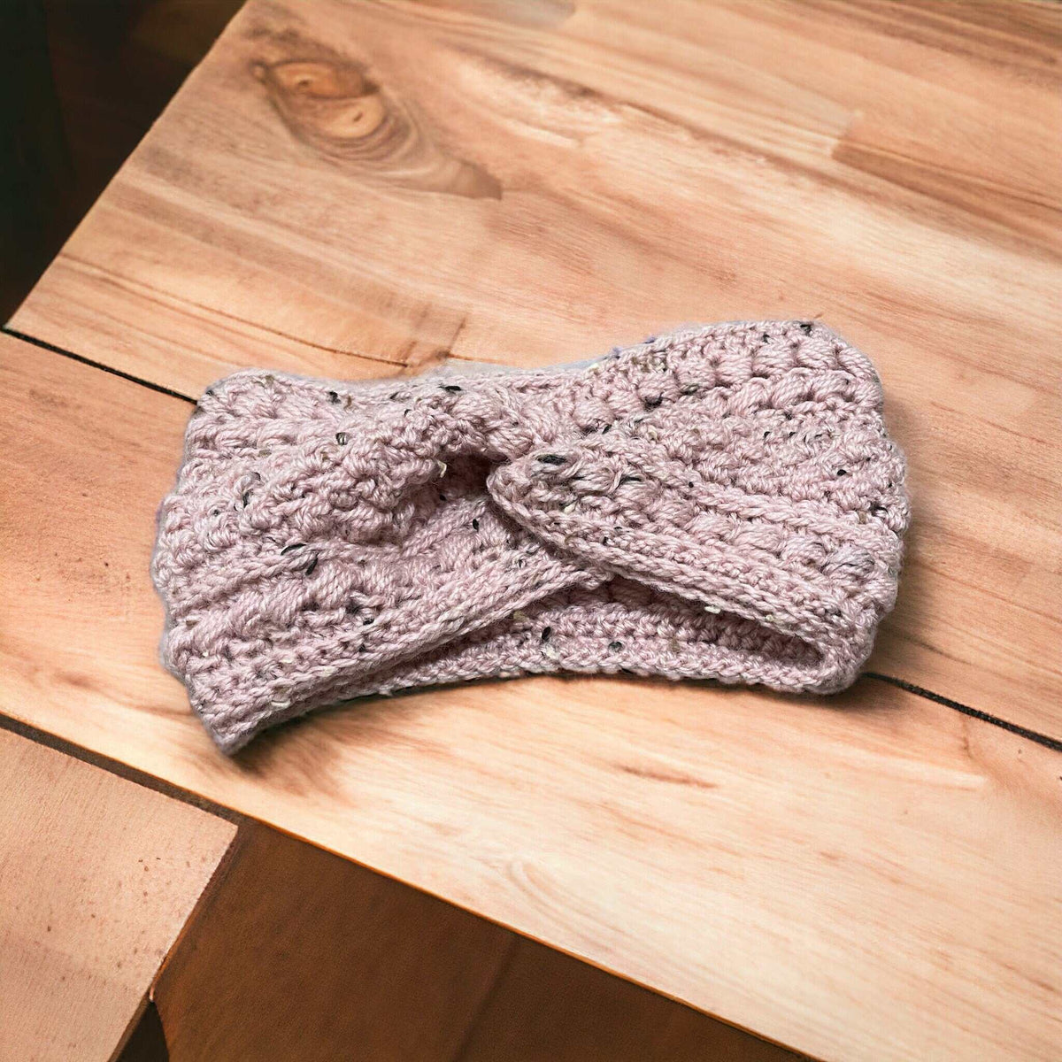 Handmade crochet headband ear warmer in winter bobble design

Cozy chunky knit headband ear warmer for women UK

Soft wool crochet ear warmer in neutral winter colour

Stylish crochet headband ear warmer with bobble detail

Handmade winter crochet accessory – cozy ear warmer