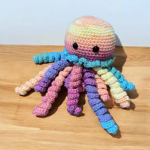 Handmade crochet jellyfish baby comforter in pastel colors