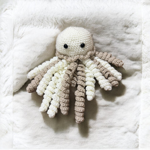 Preemie crochet jellyfish sensory toy in soft pastel yarn