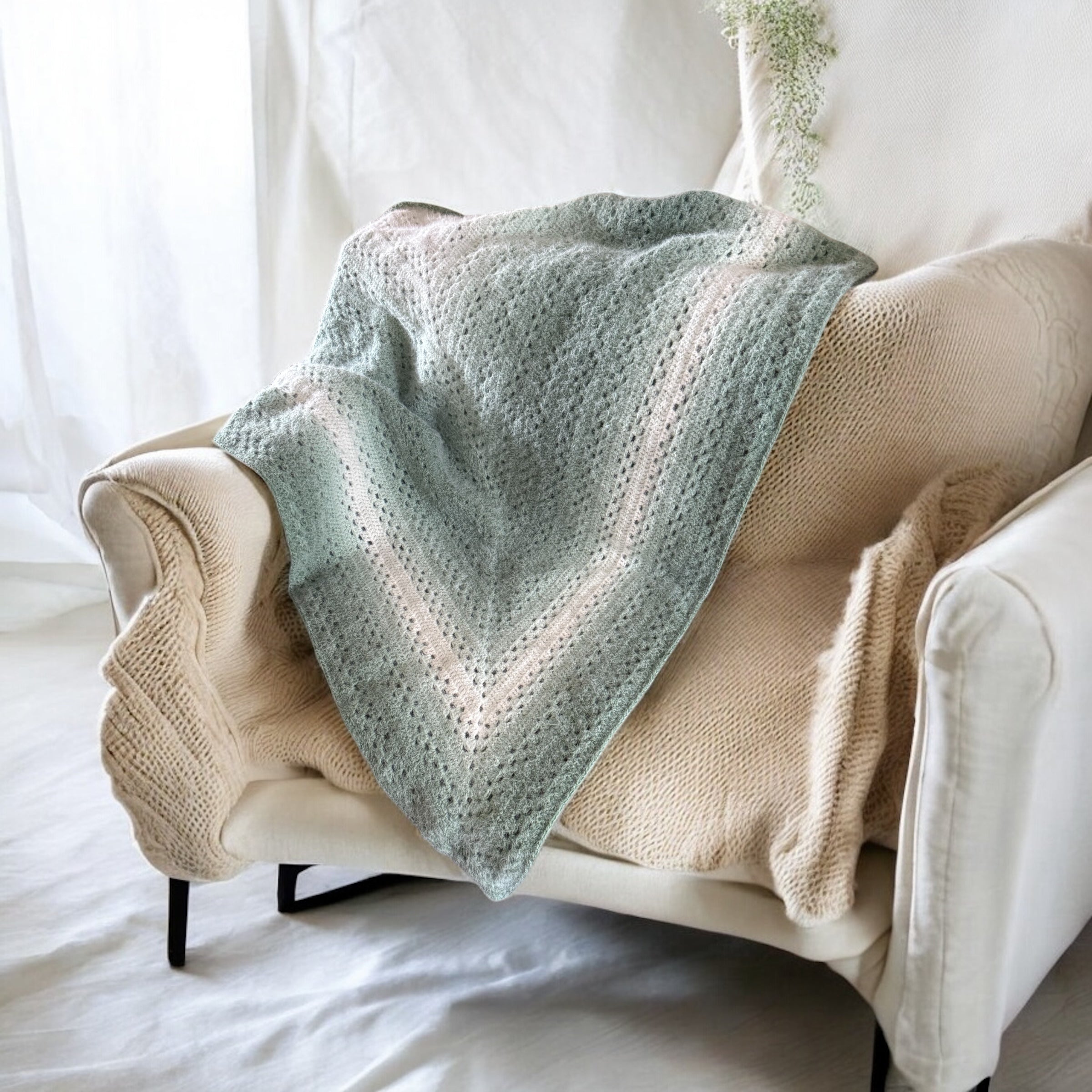 Handmade crocheted sage green ombre shawl wrap

Lightweight crochet wrap in ombre green tones

Boho crochet scarf wrap draped over shoulders