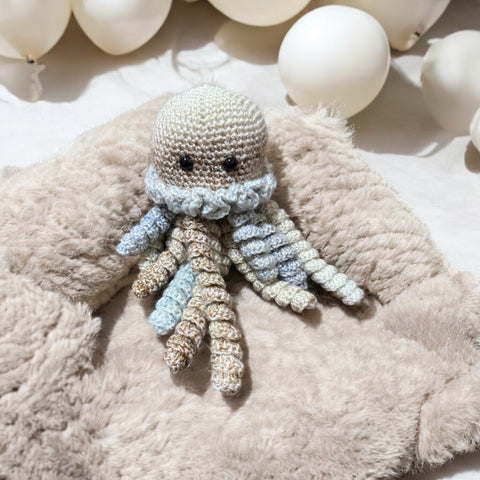 Handmade crochet octopus baby toy with tentacles
