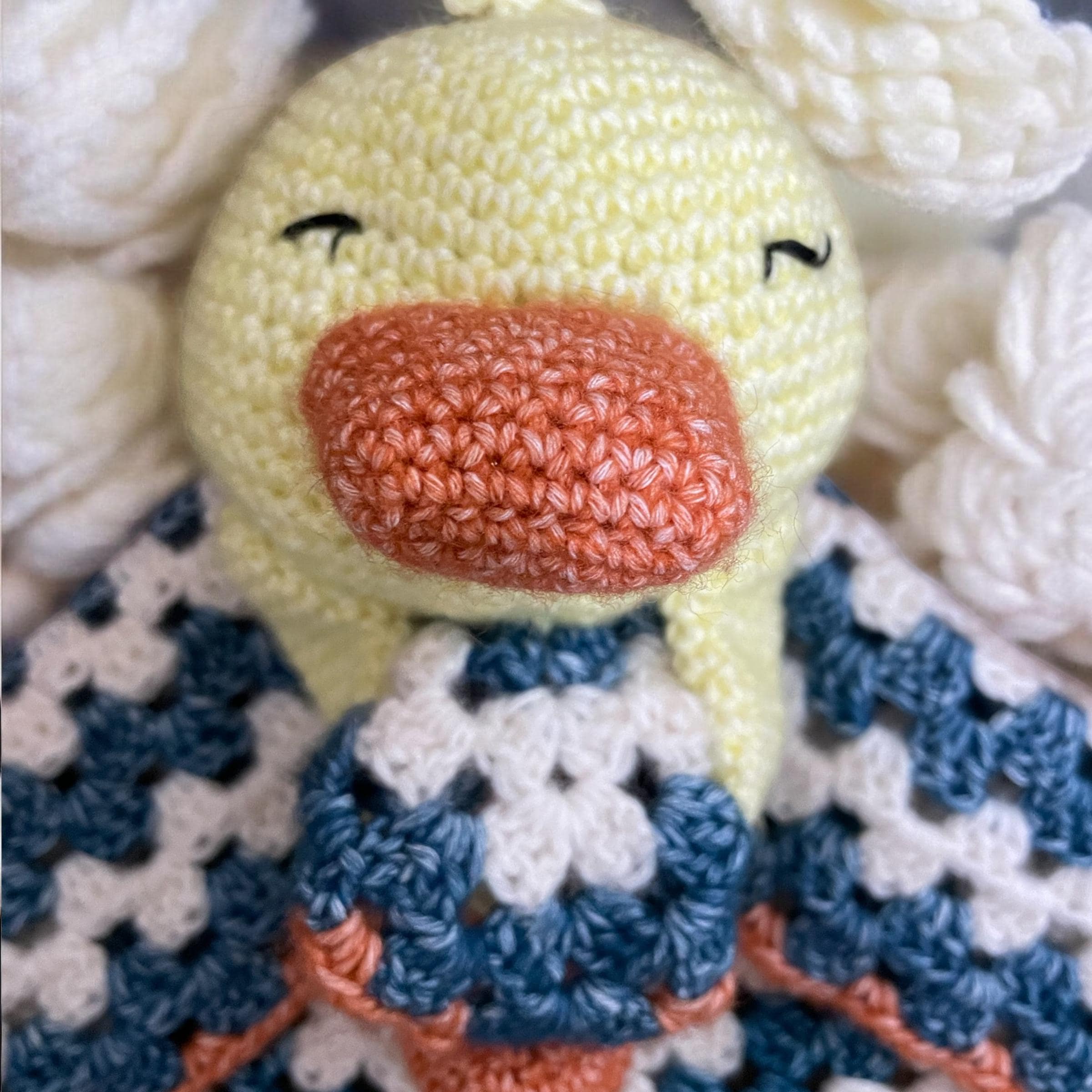 Soft baby lovey blanket with crochet duck design