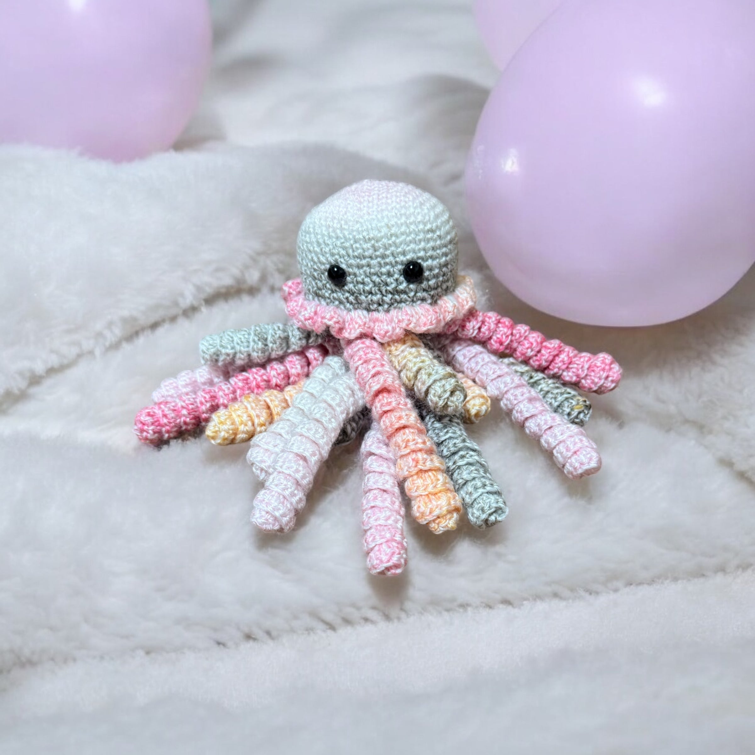Baby cuddling crochet jellyfish toy