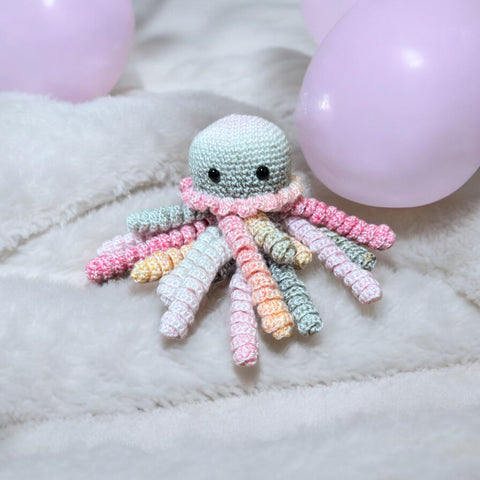 Baby cuddling crochet jellyfish toy