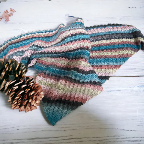 
Cozy winter scarf in layered crochet design

Artisan-crafted crochet scarf in boho style

Multi-color crochet scarf styled with winter coat

Handcrafted crochet wrap for women and men