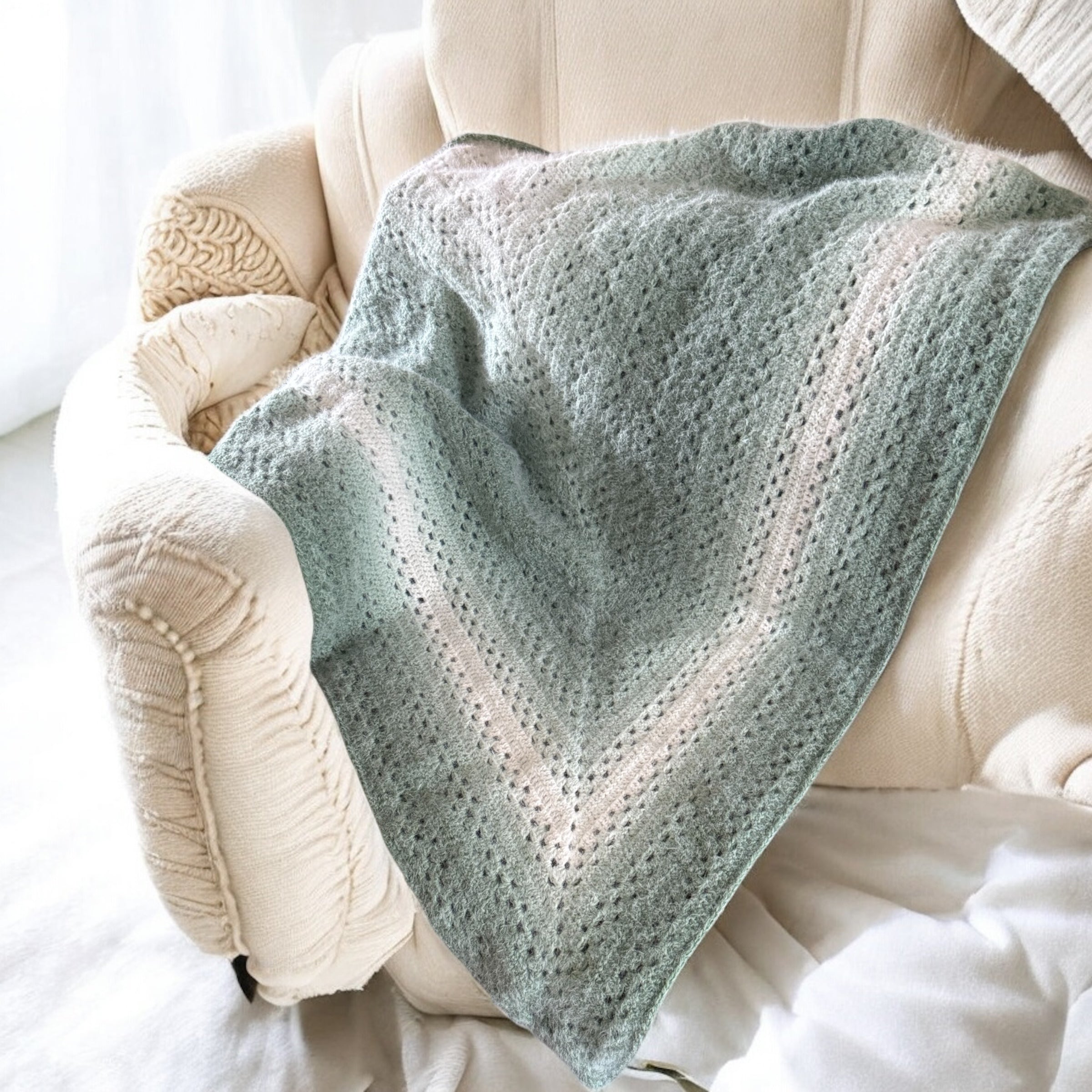 Handmade crocheted sage green ombre shawl wrap

Lightweight crochet wrap in ombre green tones

Boho crochet scarf wrap draped over shoulders

Crochet ombre sage green shawl gift for her