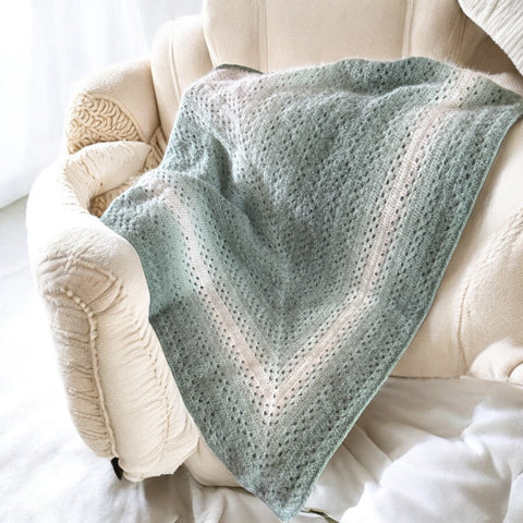 Handmade crocheted sage green ombre shawl wrap

Lightweight crochet wrap in ombre green tones

Boho crochet scarf wrap draped over shoulders

Crochet ombre sage green shawl gift for her