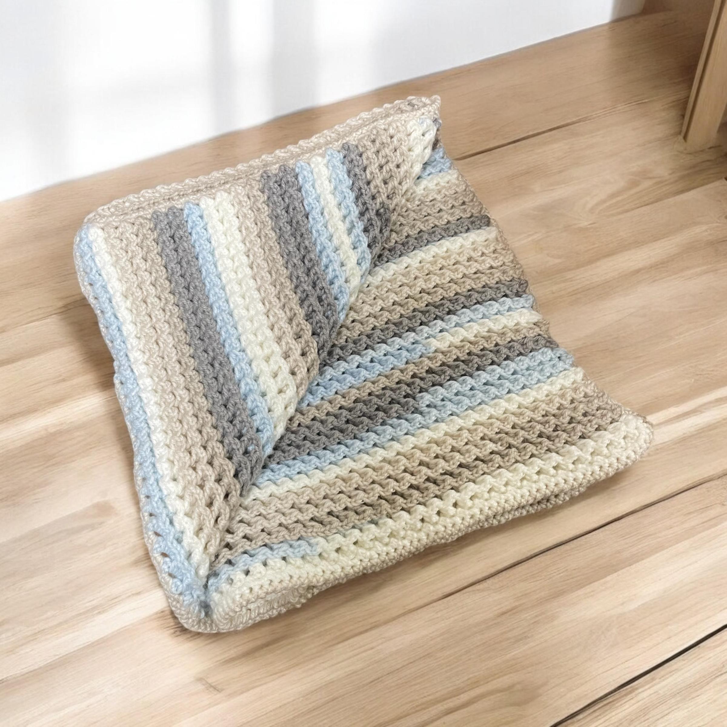 Oversized warm baby blanket for newborns

Soft nursery throw for infants and toddlers

Cozy baby blanket wrapped around infant

Neutral color large baby blanket UK