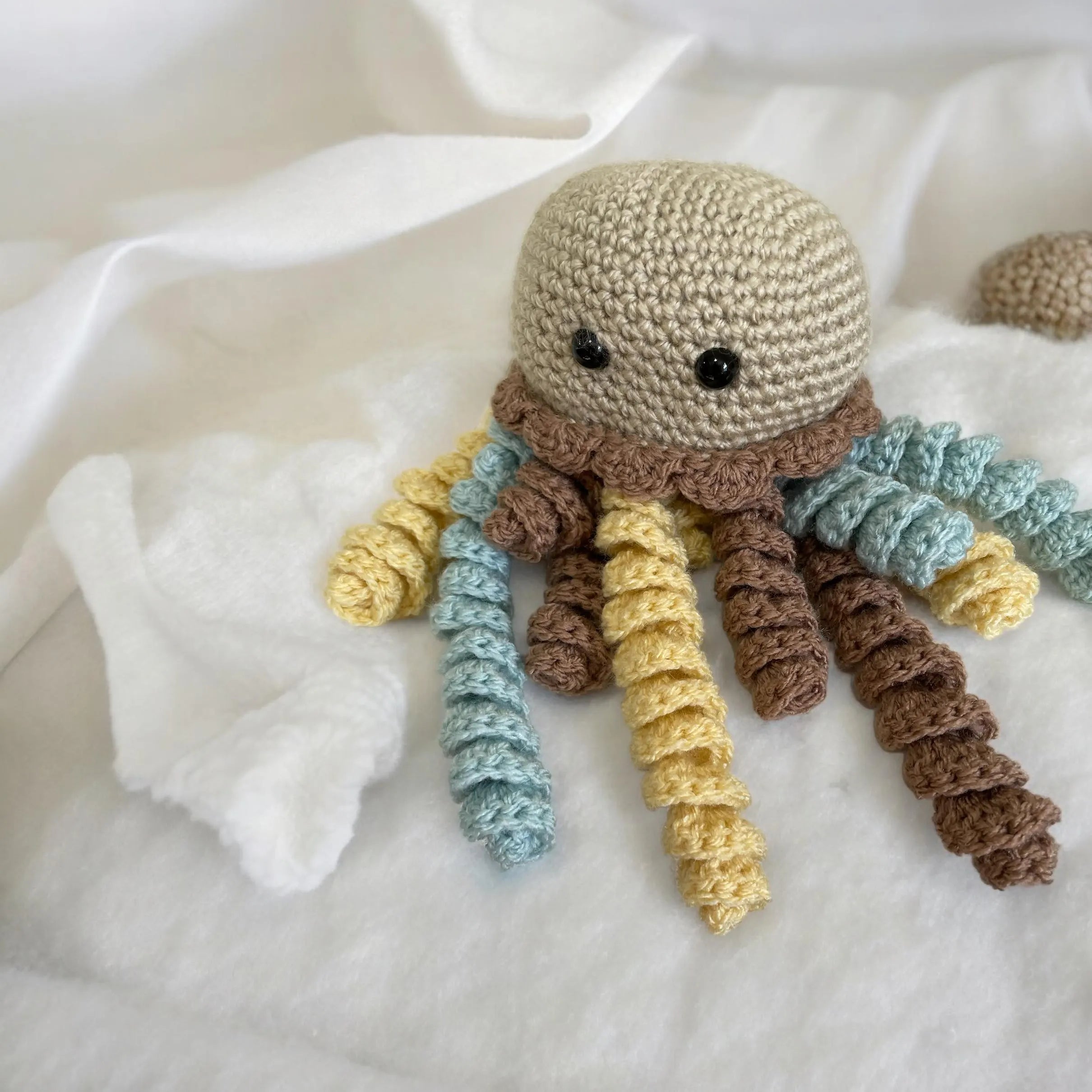 Handmade baby shower gift – crochet octopus toy