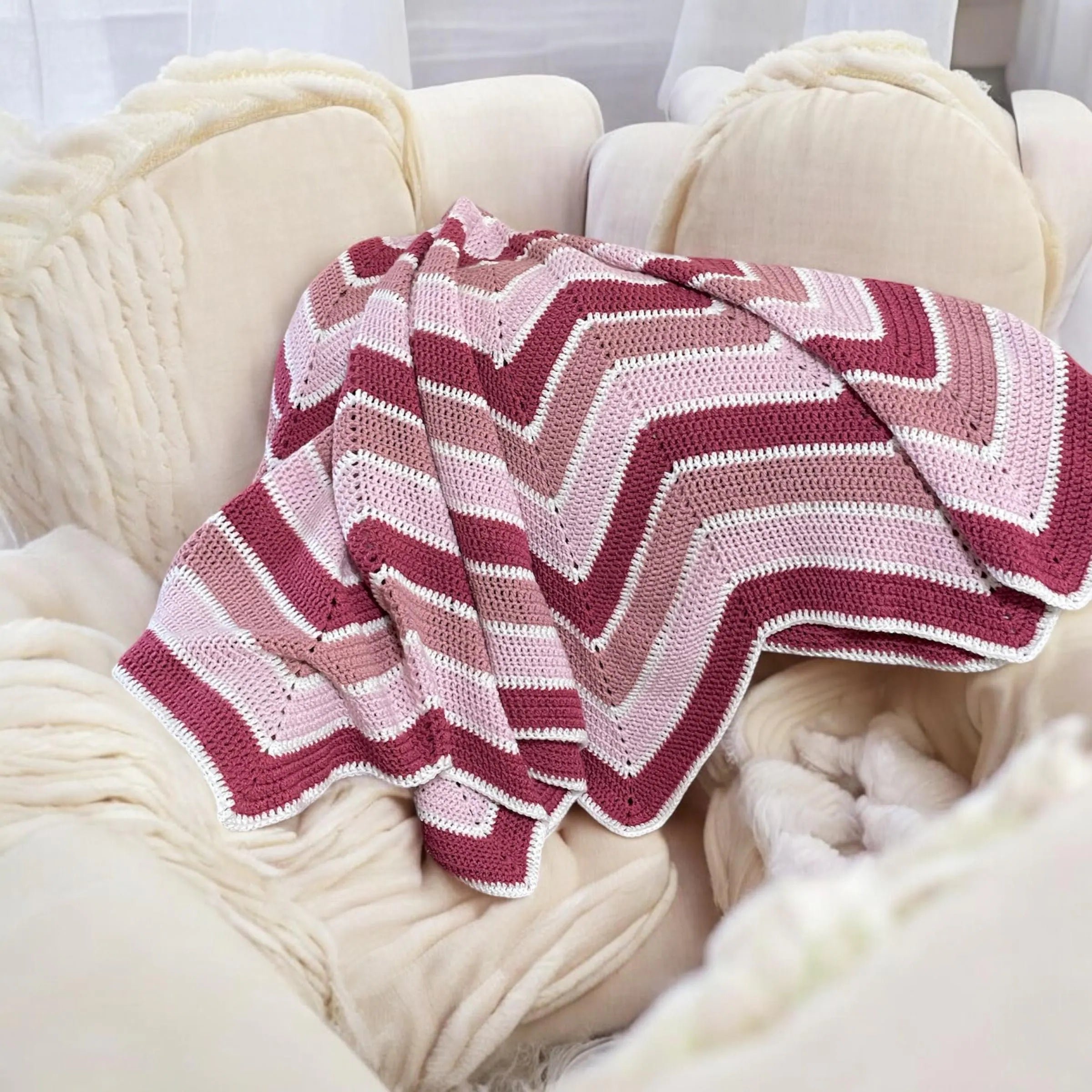 Neutral crochet baby blanket folded on chair

Baby lying on durable handmade crochet play mat

Cozy crochet blanket gift for newborns