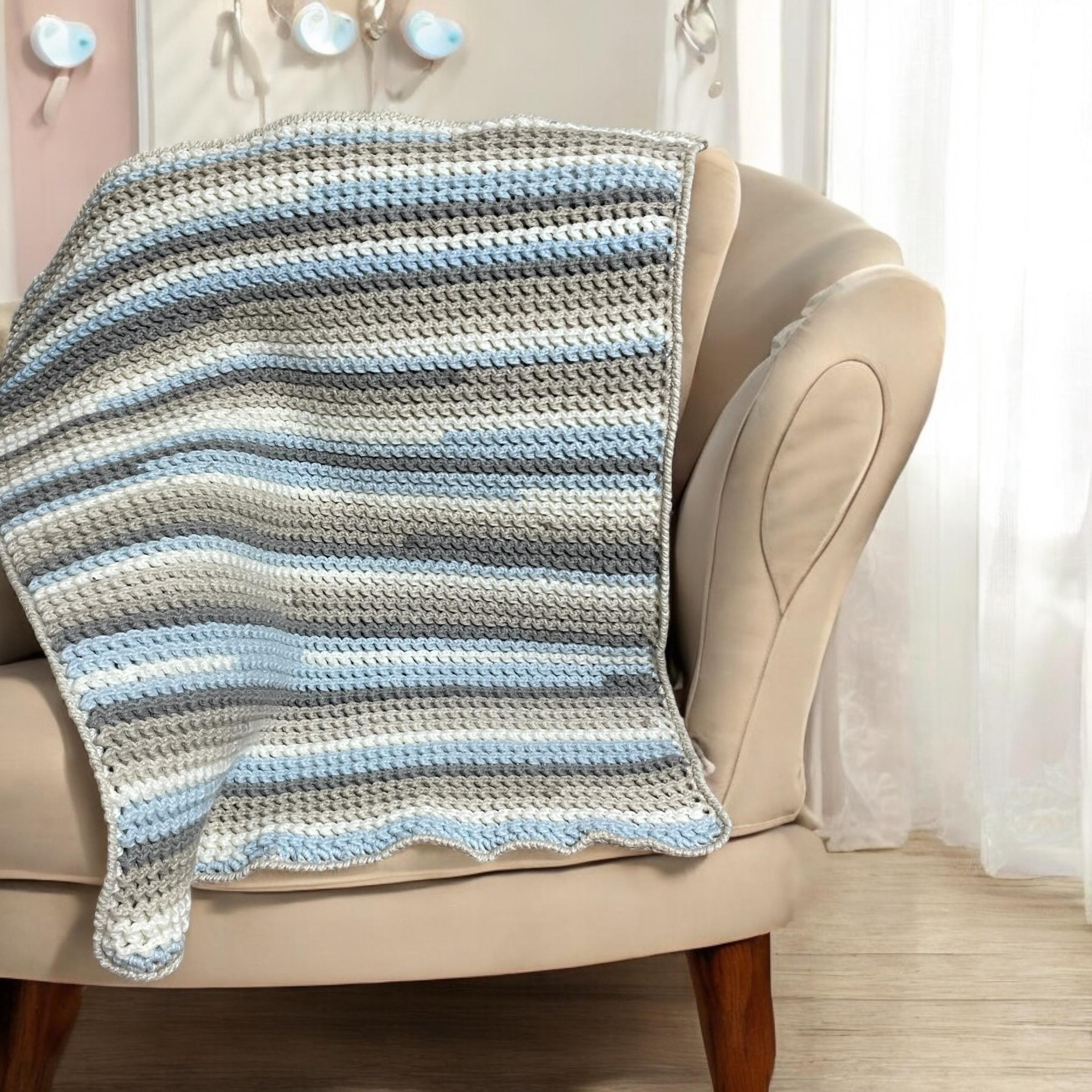 Cozy baby blanket wrapped around infant

Neutral color large baby blanket UK